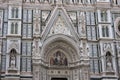 Detail of the upper part of the main door of the cathedral of Santa Maria del Fiore, with a fresco painted on the upper