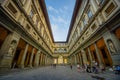 FLORENCE, ITALY - JUNE 12, 2015: Long street surrounded by historic buildings, nice and old architecture in Florence Royalty Free Stock Photo