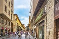 Tourists walking on the medieval Ponte Vecchio in Florence, Italy Royalty Free Stock Photo