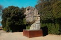 Florence, Italy - March 16 2023: Side view of the enormous bronze face sculpture Tindaro Screpolato by famous artist