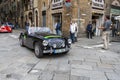 Black cabriolet in the rally Mille Miglia 2010 edition