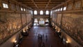 Florence, Italy, May 20, 2023 : interiors and architectural details of the Palazzo Vecchio and the statues of the squares