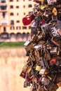 Florence, Italy. May 16, 2018. Numerous padlocks linked to the bars of the city