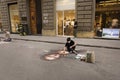 Florence, Italy - May 9, 2023 A street artist draws the Mona Lisa