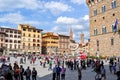 Florence, Italy - May 2018: Tourists on Signoria square in center of Florence