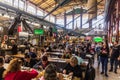 FLORENCE, ITALY - OCTOBER 21, 2018: People eat the the food court in Mercato Centrale in Florence, Ita