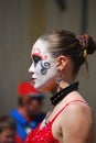 Florence Italy - Profile of a young woman in white, black and red.