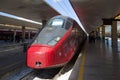 Head car of the high-speed train AGV Alstom of national carrier of NTV close up. Florence