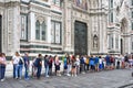 Florence, Italy - September 18, 2019: A long line of people waiting to enter to the Duomo in Florence. A line of tourists wait to