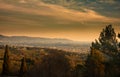 Florence and the mountainous surroundings at sunset from the hill of the town of Fiesole. Tuscany