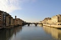 Florence old Italian town medieval buildings urban panorama beautiful cityscape water bridge sky background Royalty Free Stock Photo