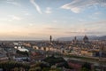 Florence romantic panoramic view from above during a coloured sunset on buildings Duomo churches and Ponte Vecchio