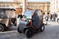 Electric car for rent is waiting for tourists on the Republic square ital. Piazza della Repubblica