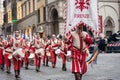 Standard bearer and drummer parades through the streets of Florence