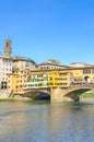 Florence, Tuscany, Italy - March 31, 2018: Famous Ponte Vecchio Bridge, medieval stone bridge over the Arno River. Major landmark