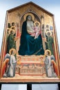 Madonna and child enthroned with Angels and saints painting in the Uffizi gallery in