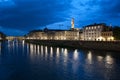 Florence waterfront with Ponte Vecchio bridge over Arno river at night in Italy Royalty Free Stock Photo