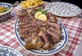 Florentine steak served with chips at an Italian restaurant Royalty Free Stock Photo