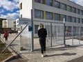 Girl entering to vote on local elections Romania