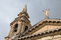 The Saint Publius Parish Church on town square in Floriana, Malta, pediment with the statue of Christ and the bell tower