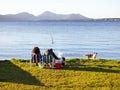 Couple barcebuing at Lagoa da Conceicao