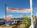 Sign for tour boats at a dock in Lagoa da Conceicao
