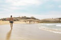 FLORIANOPOLIS, BRAZIL - JANUARY 22, 2023 : people relax on the beach Mole, Florianopolis, Brazil