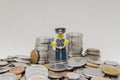 Policeman in uniform handcuffed by corruption near coins Royalty Free Stock Photo