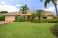 Florida clean ranch style home with roof hole to accomodate palm tree