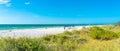 Florida, USA - September 17, 2019: Indian rocks beach with green grass in Florida, USA