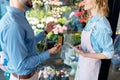 Florist and buyer with credit card