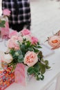 florist creates a beautiful bouquet of artificial flowers