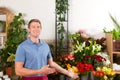 Florist in flower shop Royalty Free Stock Photo