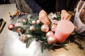 Florist hands making a stylish Christmas decoration composition Royalty Free Stock Photo