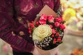 Florist holding bouquet colorful flowers shop assistant hands