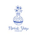 Florist shop premium logo, badge for floral boutique, florists hand drawn vector Illustration in blue color on a white Royalty Free Stock Photo