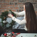 Florist Woman with Christmas Deco at Home Office