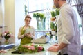 Florist woman and man making order at flower shop Royalty Free Stock Photo