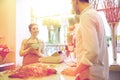 Florist woman and man making order at flower shop Royalty Free Stock Photo