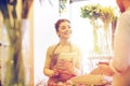 Florist woman and man making order at flower shop Royalty Free Stock Photo