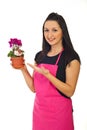 Florist woman offering cyclamen for sale