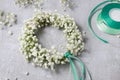 Florist at work. How to make gypsophila paniculata wedding wreath, step by step