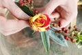 How to make a hair clip with fresh roses, carnations and leaves, tutorial Royalty Free Stock Photo