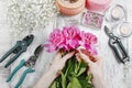 Florist at work. Woman making spring floral decorations Royalty Free Stock Photo