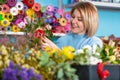 Florist in the workplace. Flower shop. Portrait of a smiling woman Royalty Free Stock Photo