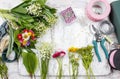 Florist workplace: flowers and accessories Royalty Free Stock Photo