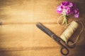 Floristic background. Flowers, scissors and rope. Royalty Free Stock Photo