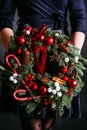 Floristics gift delivery service christmas wreath Royalty Free Stock Photo