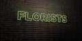 FLORISTS -Realistic Neon Sign on Brick Wall background - 3D rendered royalty free stock image