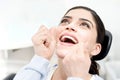 Floss really help me to care my teeth. Royalty Free Stock Photo